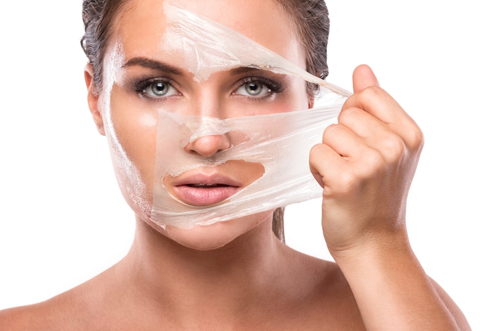 Woman Applying Facial Cream