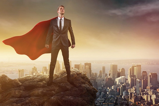 Superman executive standing on hill