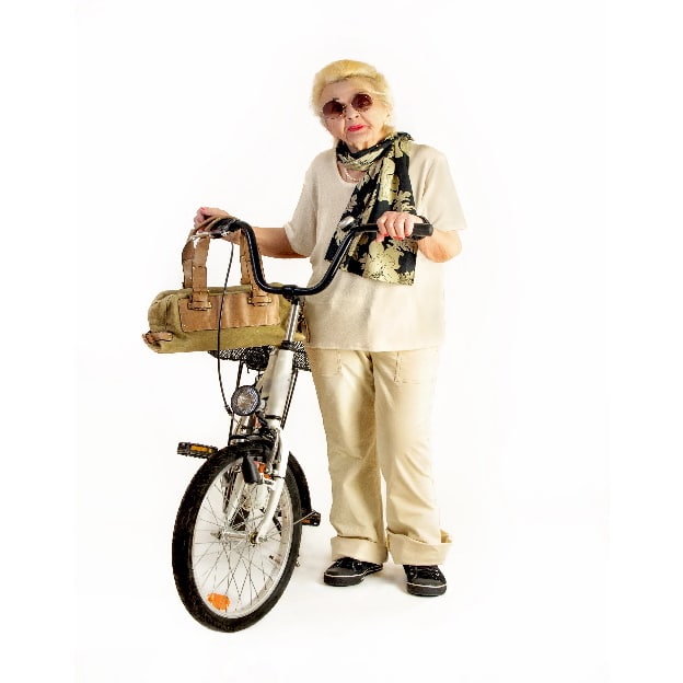 elderly lady with a bicycle on a white background 624x624