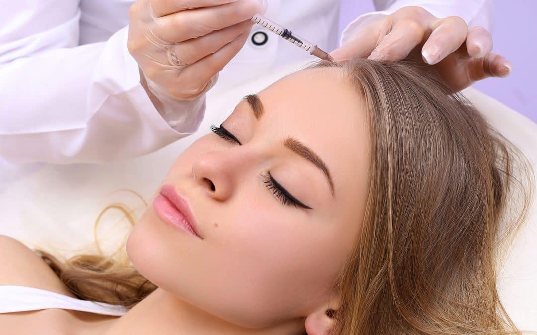 Woman getting botox on the face