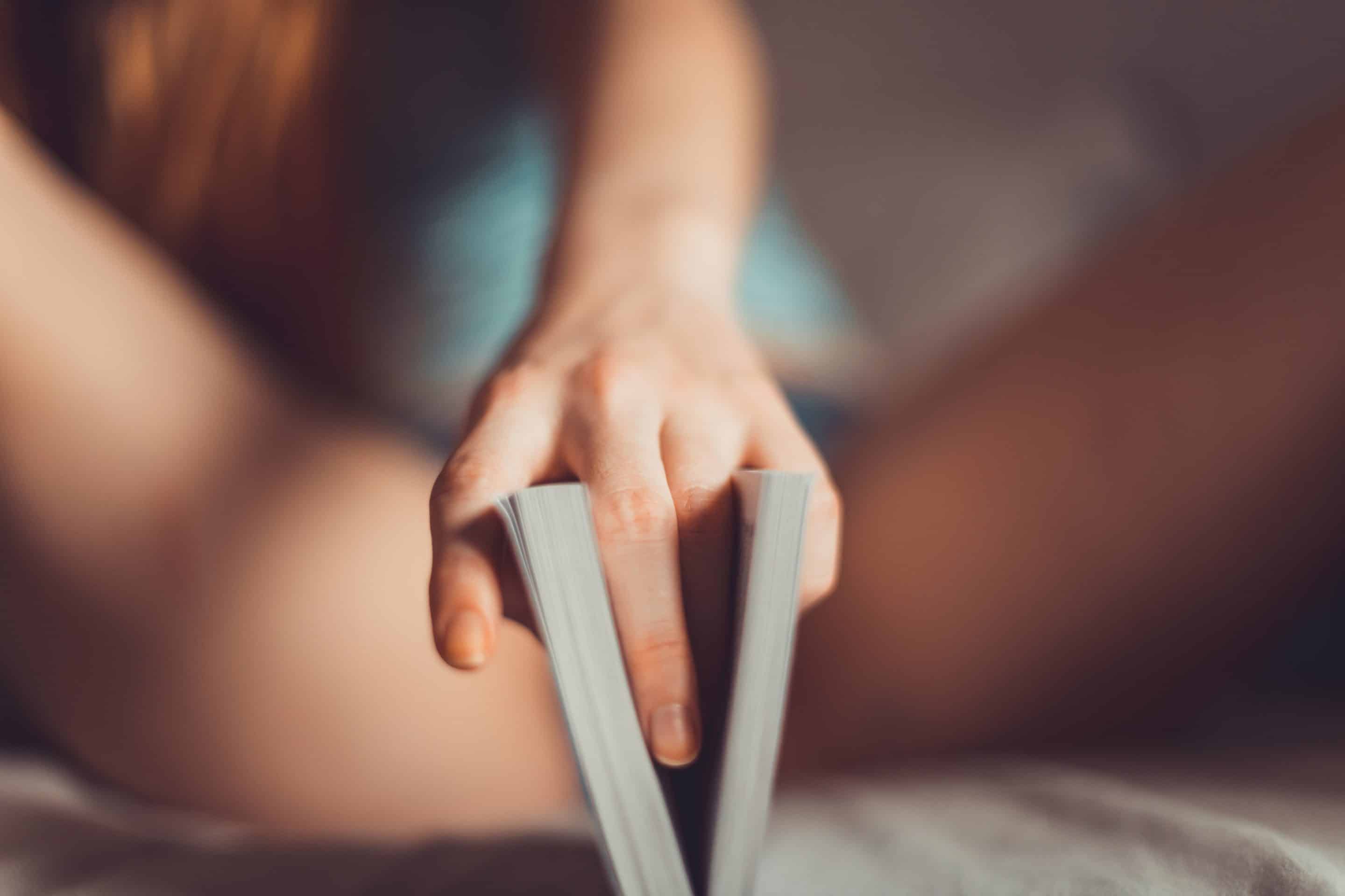 a girl on her underwear with condom on her side photo by Dainis Graveris from Unsplash